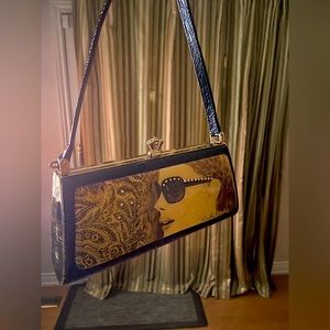 Debbie brooks purse/clutch style.